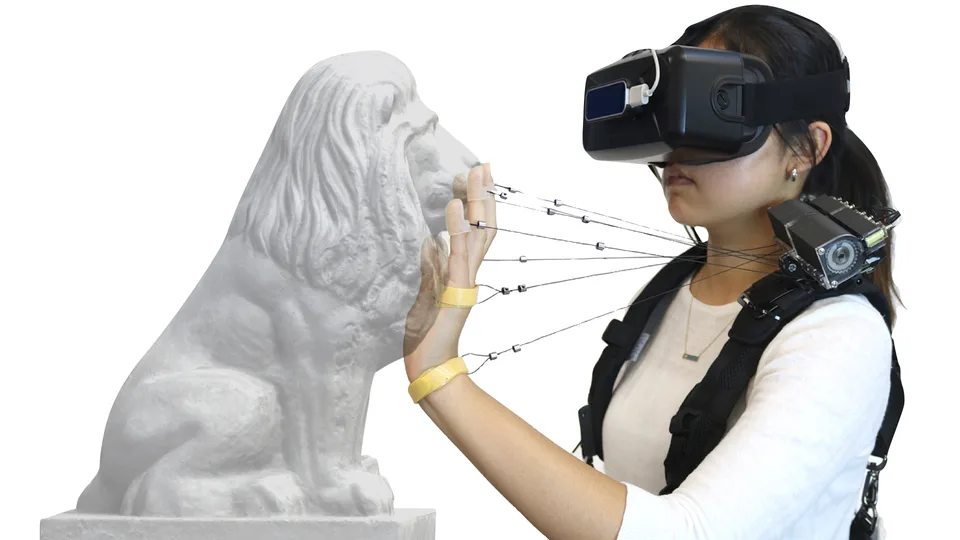 Wireality: Enabling Complex Tangible Geometries in VR with Worn Multi-String Haptics